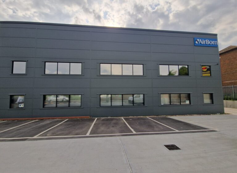 Installing window tint film for AirBorn International Ltd