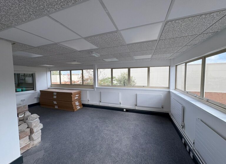 Dark Reflective Window Film for Commercial Building in Cheshire