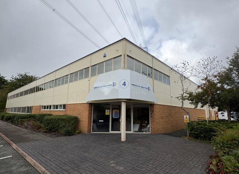 Dark Reflective Window Film for Commercial Building in Cheshire